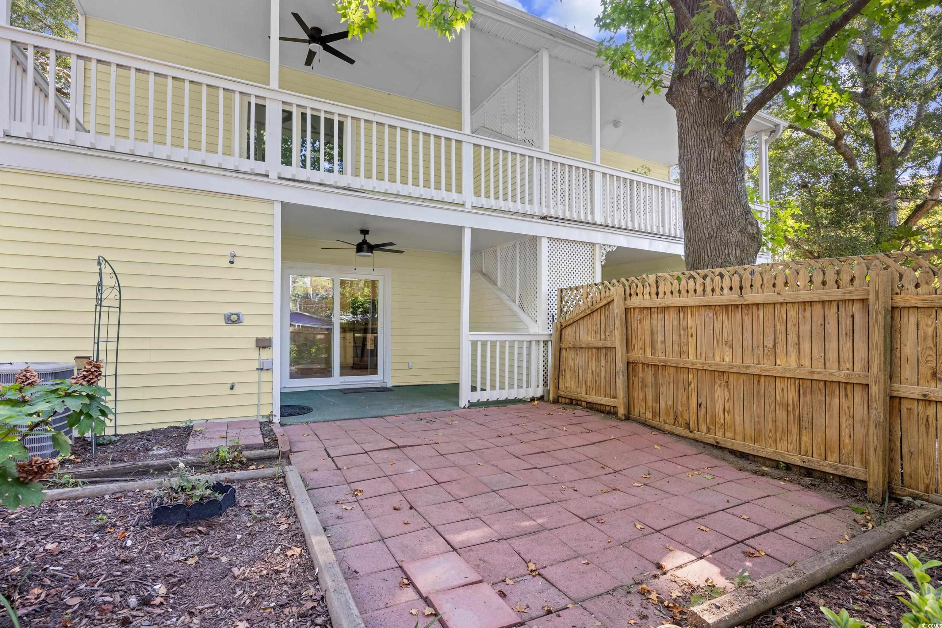 617 Surfside Drive Surfside Beach, SC 29575 - Photo 6 of 39 View of patio / terrace featuring ceiling fan