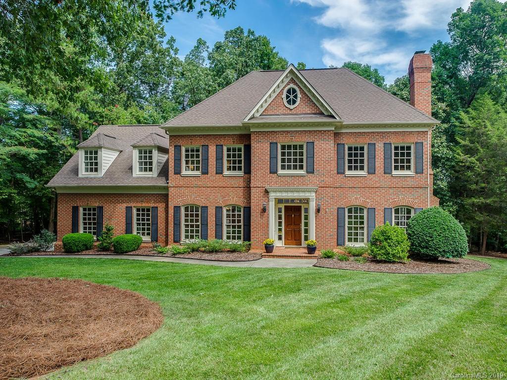 4501 Nora's Path Road Charlotte, NC 28226 - Photo 1 of 32 a front view of a house with a yard