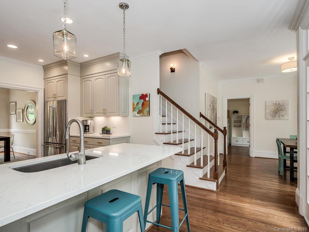 4501 Nora's Path Road Charlotte, NC 28226 - Photo 11 of 32 a room with wooden floor pool table and chairs