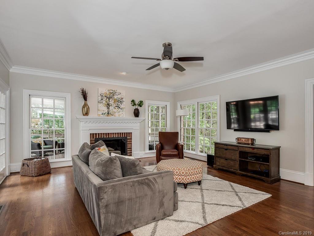4501 Nora's Path Road Charlotte, NC 28226 - Photo 13 of 32 a living room with furniture and a flat screen tv