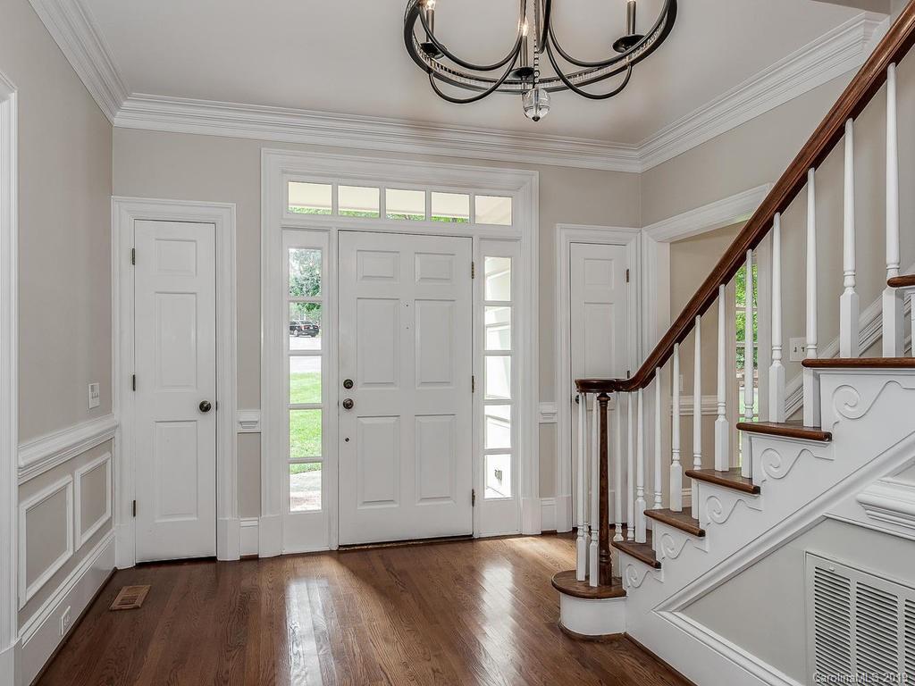 4501 Nora's Path Road Charlotte, NC 28226 - Photo 3 of 32 a view of an entryway with wooden floor and door