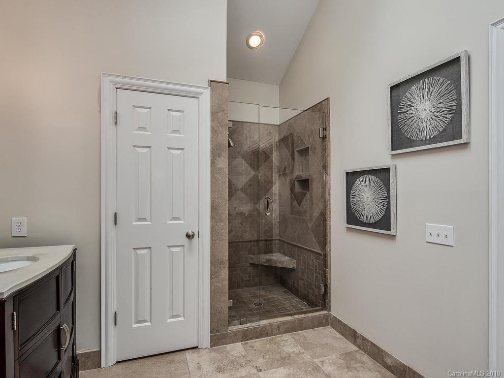 4501 Nora's Path Road Charlotte, NC 28226 - Photo 22 of 32 a bathroom with a shower and a sink