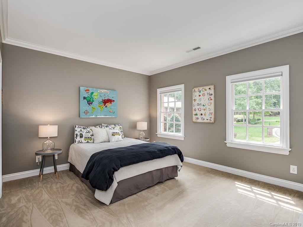 4501 Nora's Path Road Charlotte, NC 28226 - Photo 23 of 32 a bedroom with a bed and a window