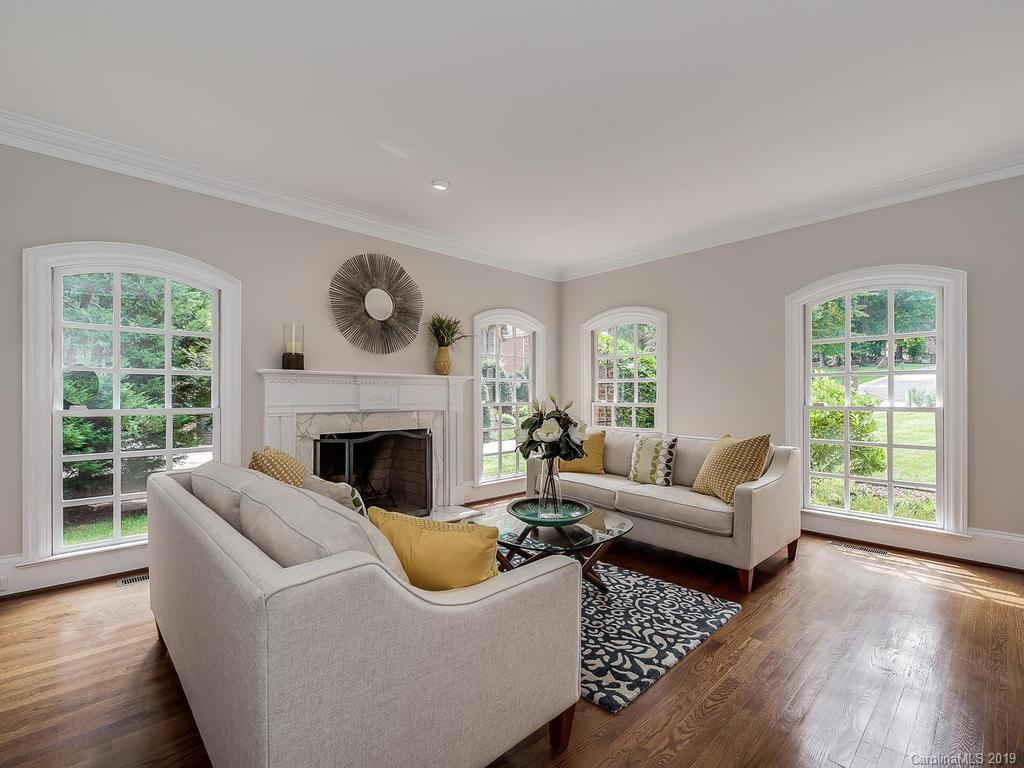 4501 Nora's Path Road Charlotte, NC 28226 - Photo 5 of 32 a living room with furniture and a fireplace