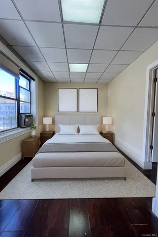 a large white bed in a large room