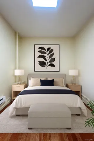 a bedroom with a large bed and a couch