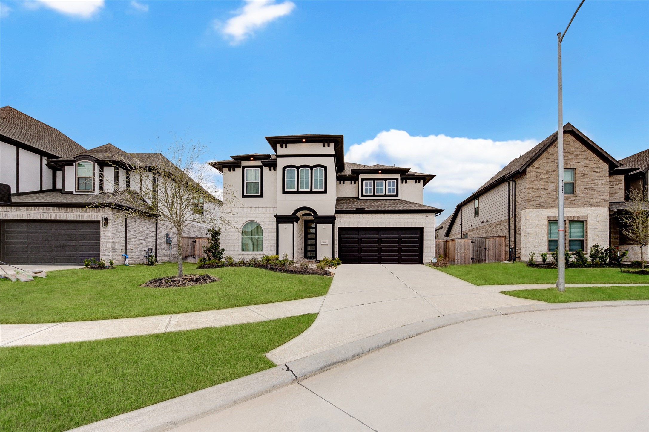 4606 Wax Myrtle Court Fulshear, TX 77441 - Photo 2 of 36 a front view of a house with a yard