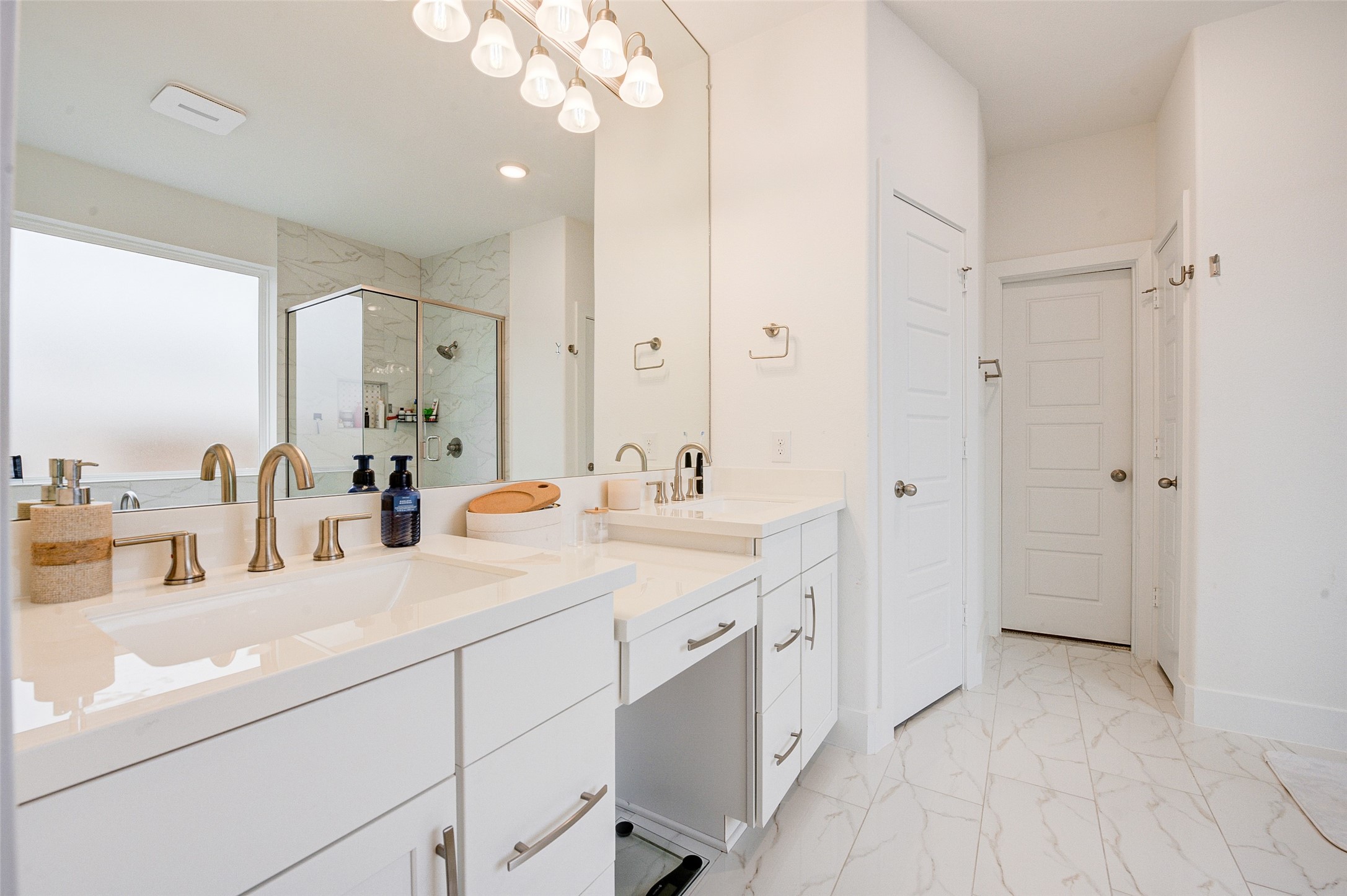 4606 Wax Myrtle Court Fulshear, TX 77441 - Photo 25 of 36 a bathroom with a sink double vanity granite and a mirror
