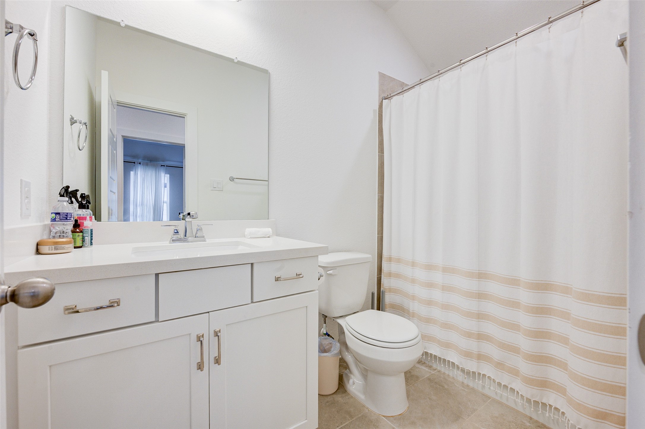 4606 Wax Myrtle Court Fulshear, TX 77441 - Photo 31 of 36 a bathroom with a sink a toilet and shower