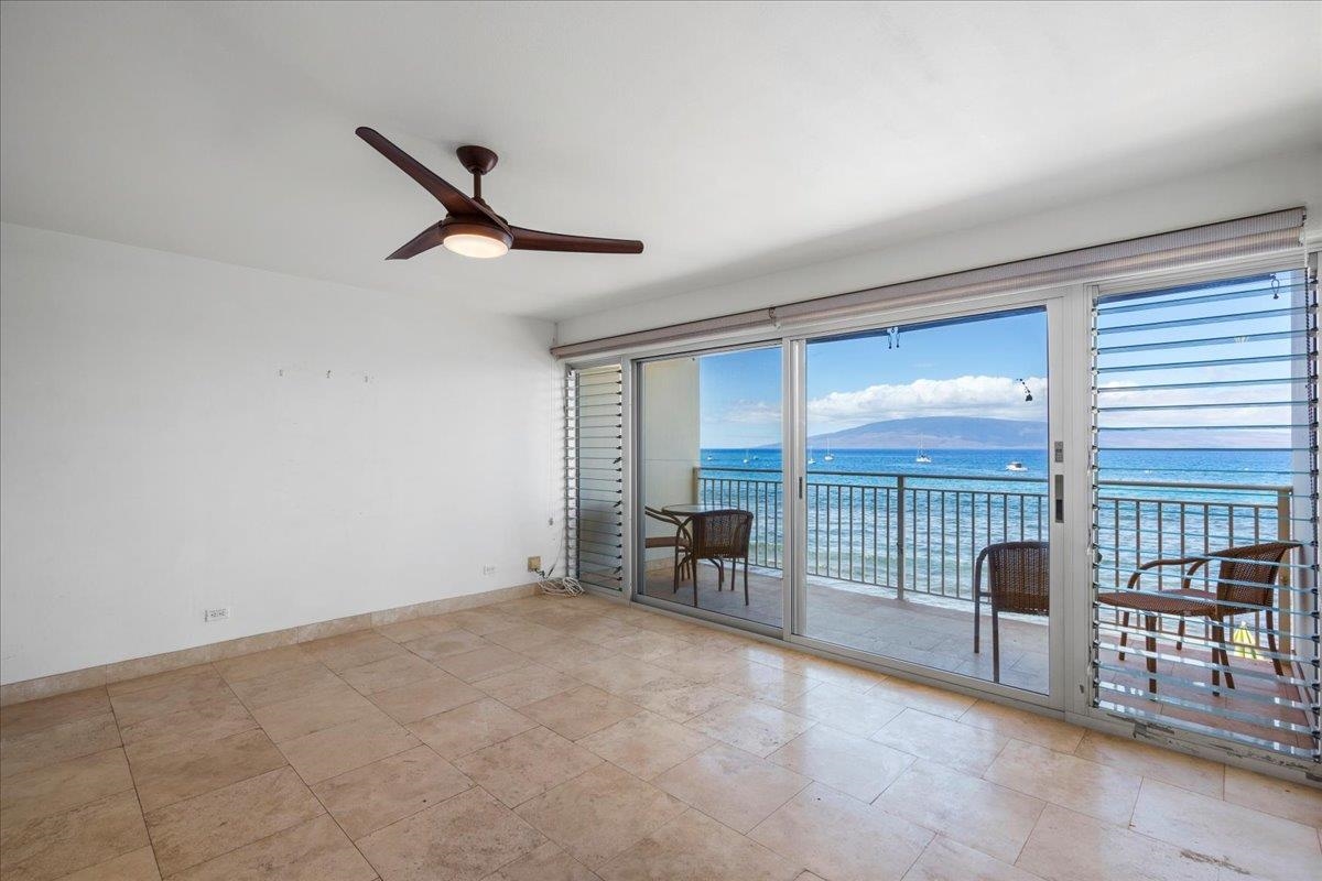 1403 Front Street, Unit 309 Lahaina, HI 96761 - Photo 3 of 33 a view of workspace with furniture and floor to ceiling window