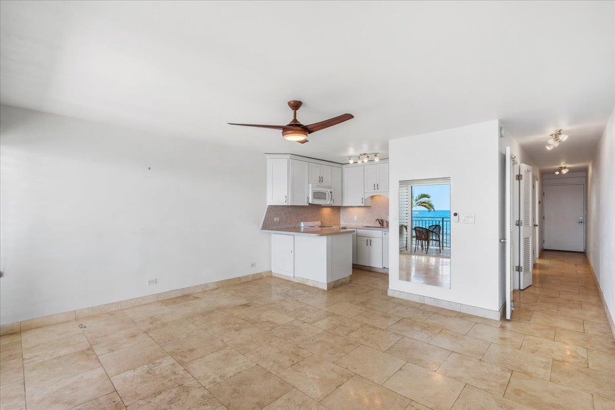 1403 Front Street, Unit 309 Lahaina, HI 96761 - Photo 7 of 33 a view of a kitchen with a sink