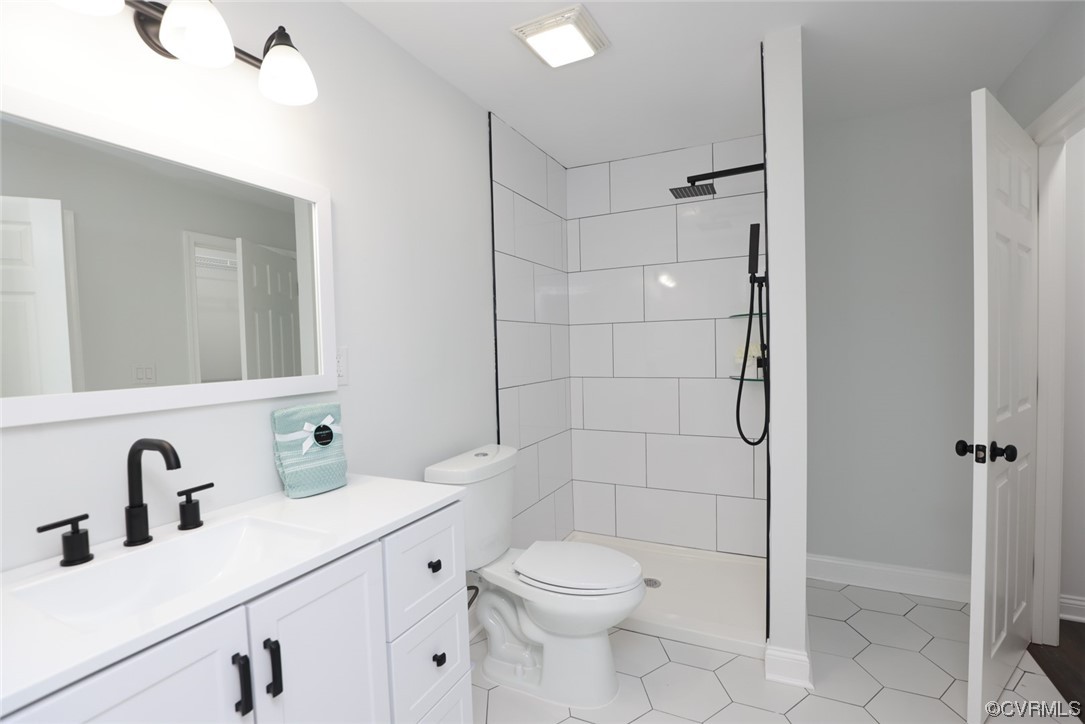 6830 Strathmore Road Richmond, VA 23237 - Photo 11 of 47 a bathroom with a sink toilet and shower