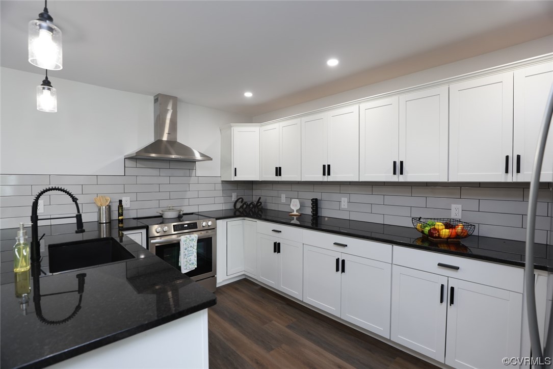 6830 Strathmore Road Richmond, VA 23237 - Photo 18 of 47 a kitchen with granite countertop white cabinets and a sink