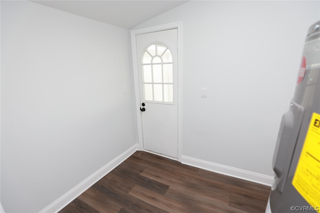 6830 Strathmore Road Richmond, VA 23237 - Photo 24 of 47 an empty room with wooden floor and a window