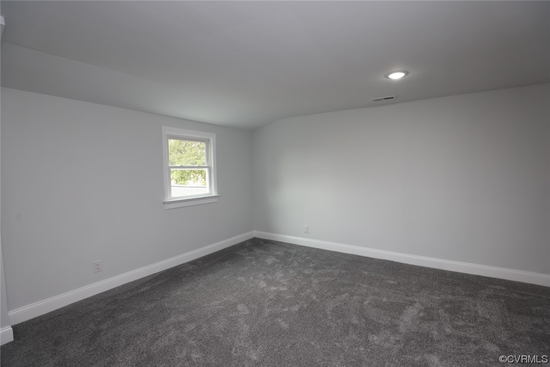 6830 Strathmore Road Richmond, VA 23237 - Photo 34 of 47 an empty room with a window