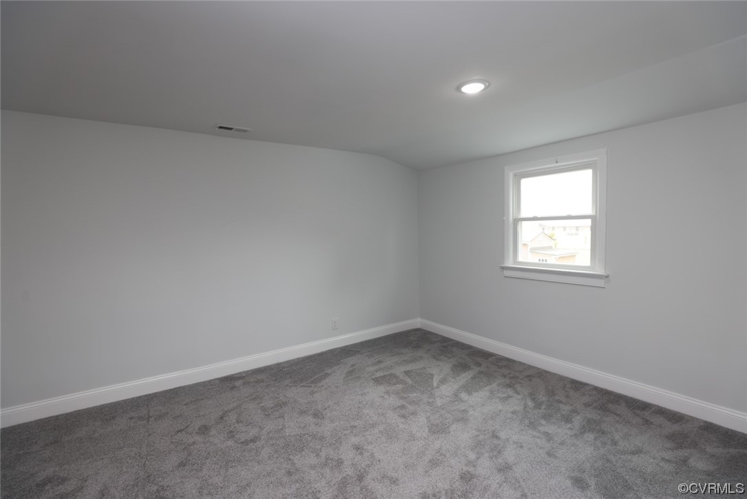 6830 Strathmore Road Richmond, VA 23237 - Photo 36 of 47 an empty room with a window
