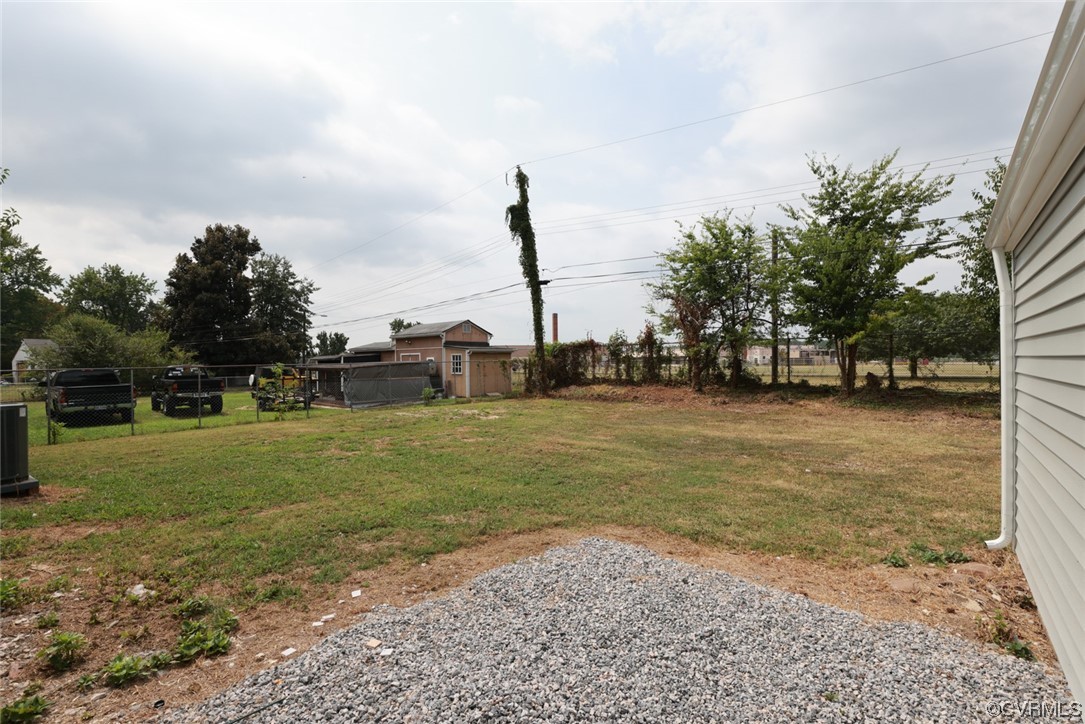 6830 Strathmore Road Richmond, VA 23237 - Photo 39 of 47 a view of a yard with a house
