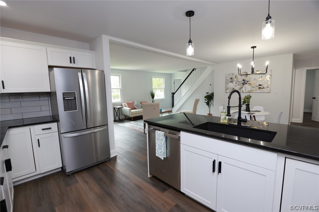6830 Strathmore Road Richmond, VA 23237 - Photo 5 of 47 a kitchen with stainless steel appliances granite countertop a refrigerator a sink dishwasher a stove and a refrigerator