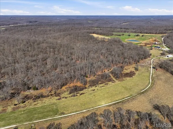 $305,000 | 86.6-acre Beechnut Road, Stover, MO 65078