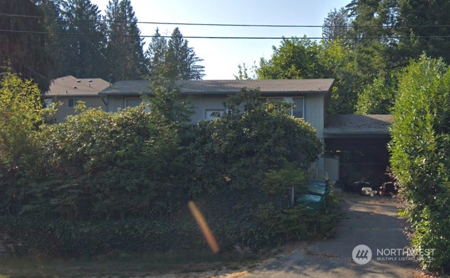 6 157th Place Southeast Bothell, WA 98012 - Photo 1 of 1 a view of a house with a yard