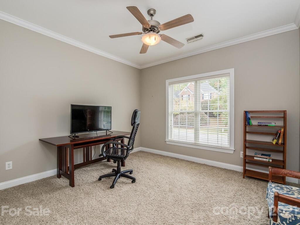3115 Planters Ridge Road Charlotte, NC 28270 - Photo 20 of 44 a view of a livingroom with furniture and a window