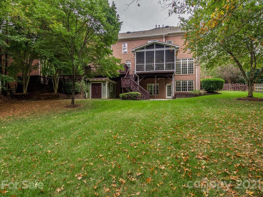 3115 Planters Ridge Road Charlotte, NC 28270 - Photo 42 of 44 a view of a house with a yard