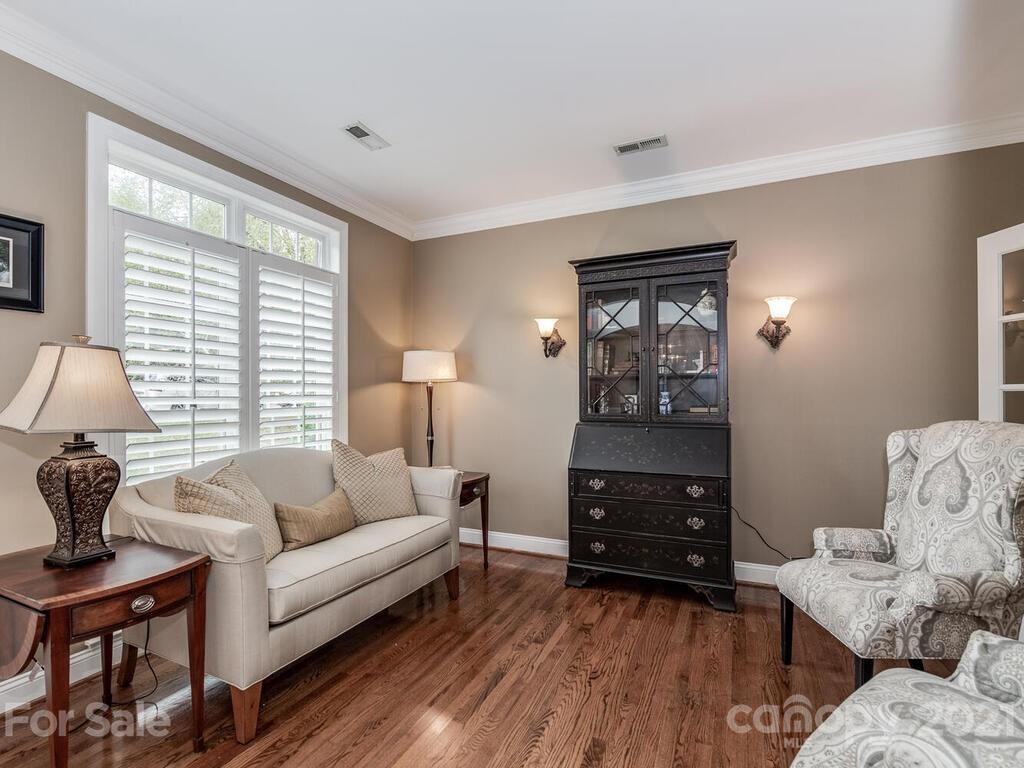 3115 Planters Ridge Road Charlotte, NC 28270 - Photo 7 of 44 a living room with furniture and a window