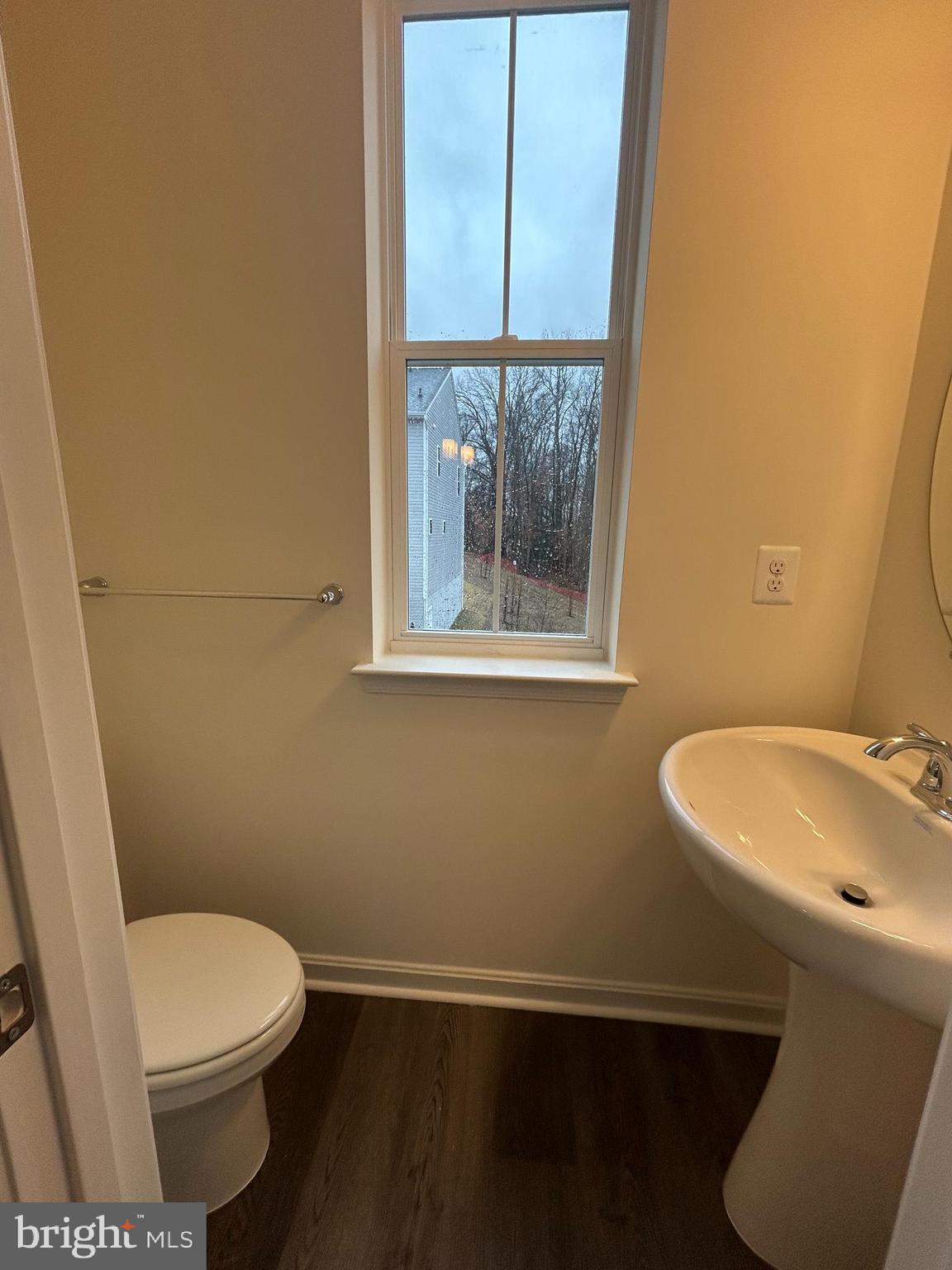 7300 Roxy Run, Unit 6 Clinton, MD 20735 - Photo 11 of 34 a bathroom with a toilet a sink and a window