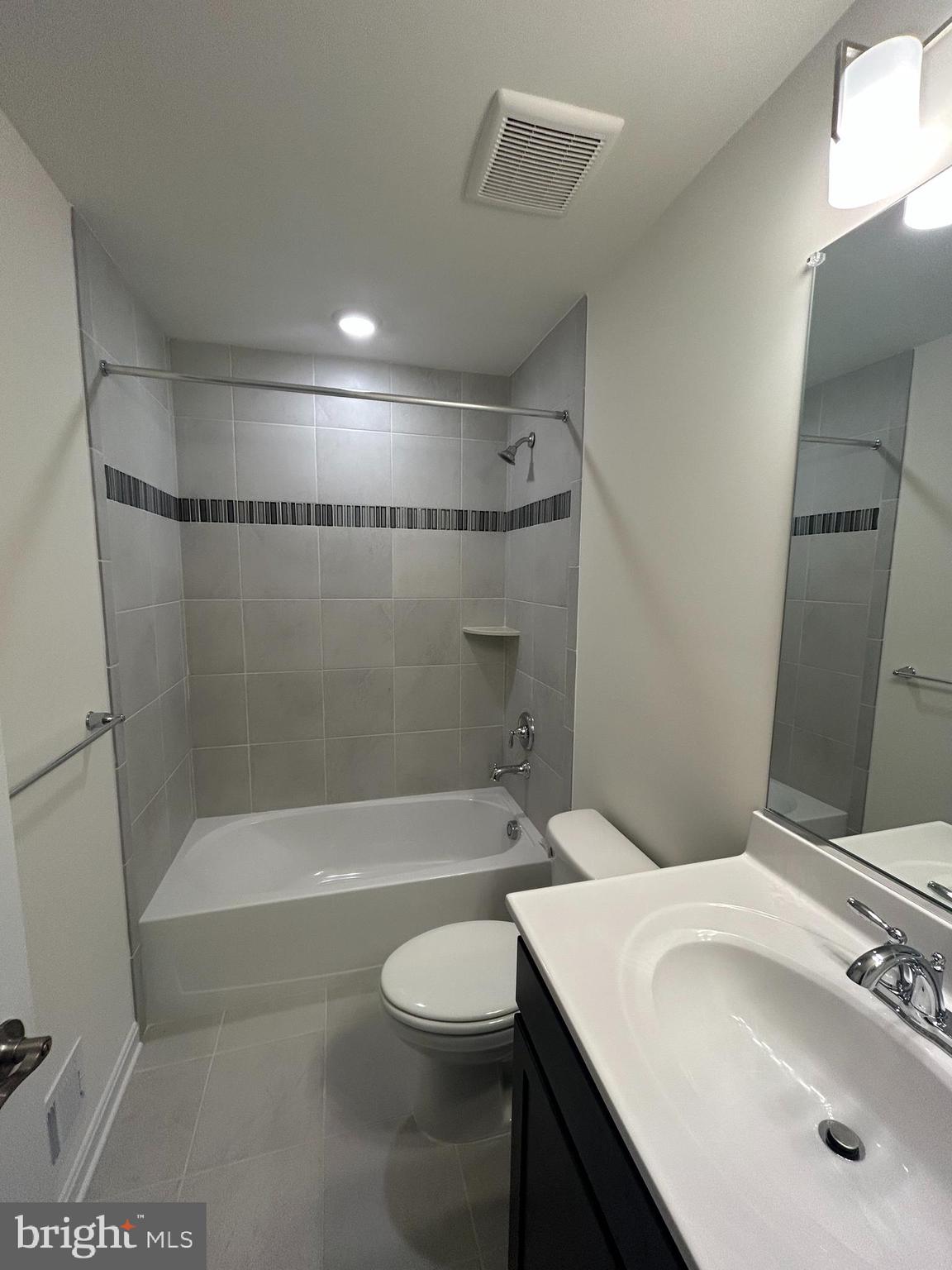 7300 Roxy Run, Unit 6 Clinton, MD 20735 - Photo 14 of 34 a bathroom with a sink a toilet and shower