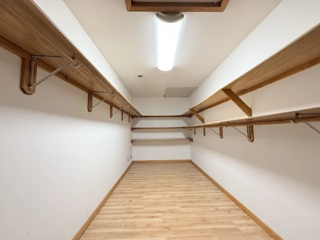 a view of a room with racks on the wall