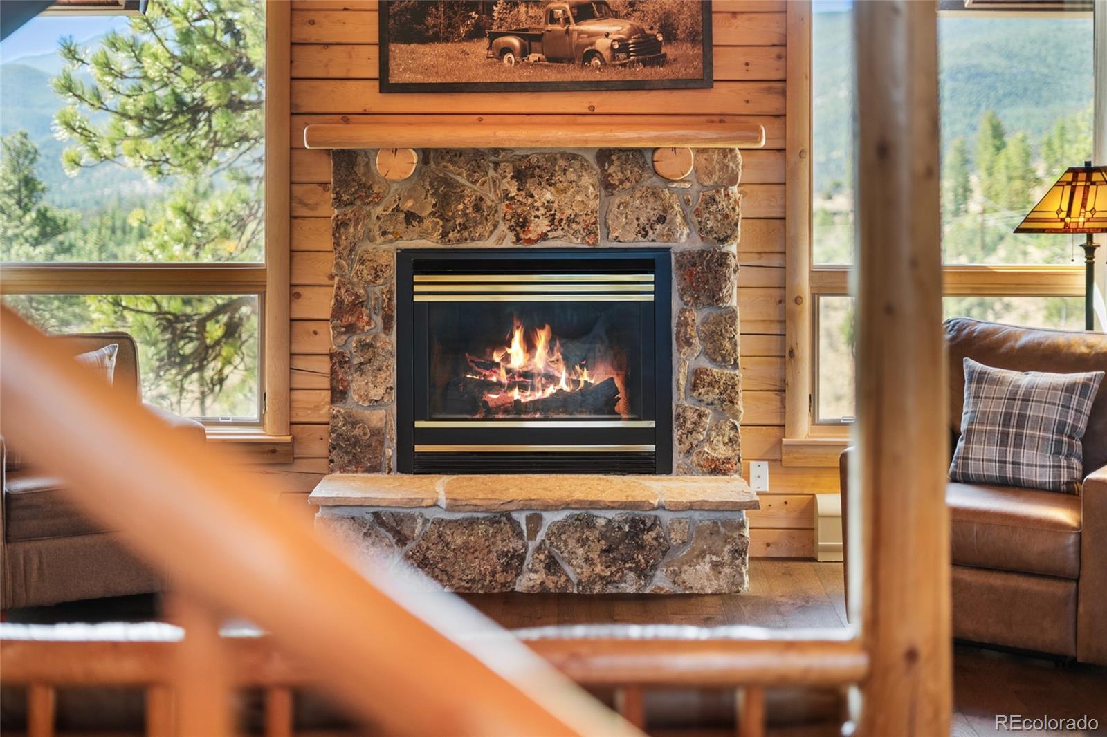 685 Jesse Lane Bailey, CO 80421 - Photo 26 of 50 a white building with a fireplace