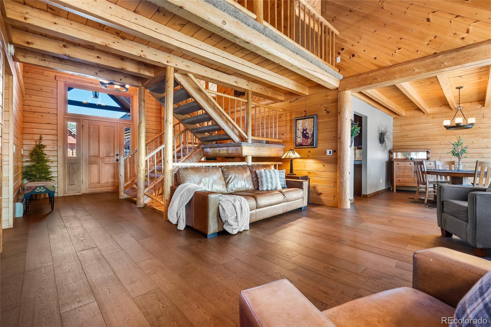 685 Jesse Lane Bailey, CO 80421 - Photo 3 of 50 a view of livingroom with furniture and wooden floor