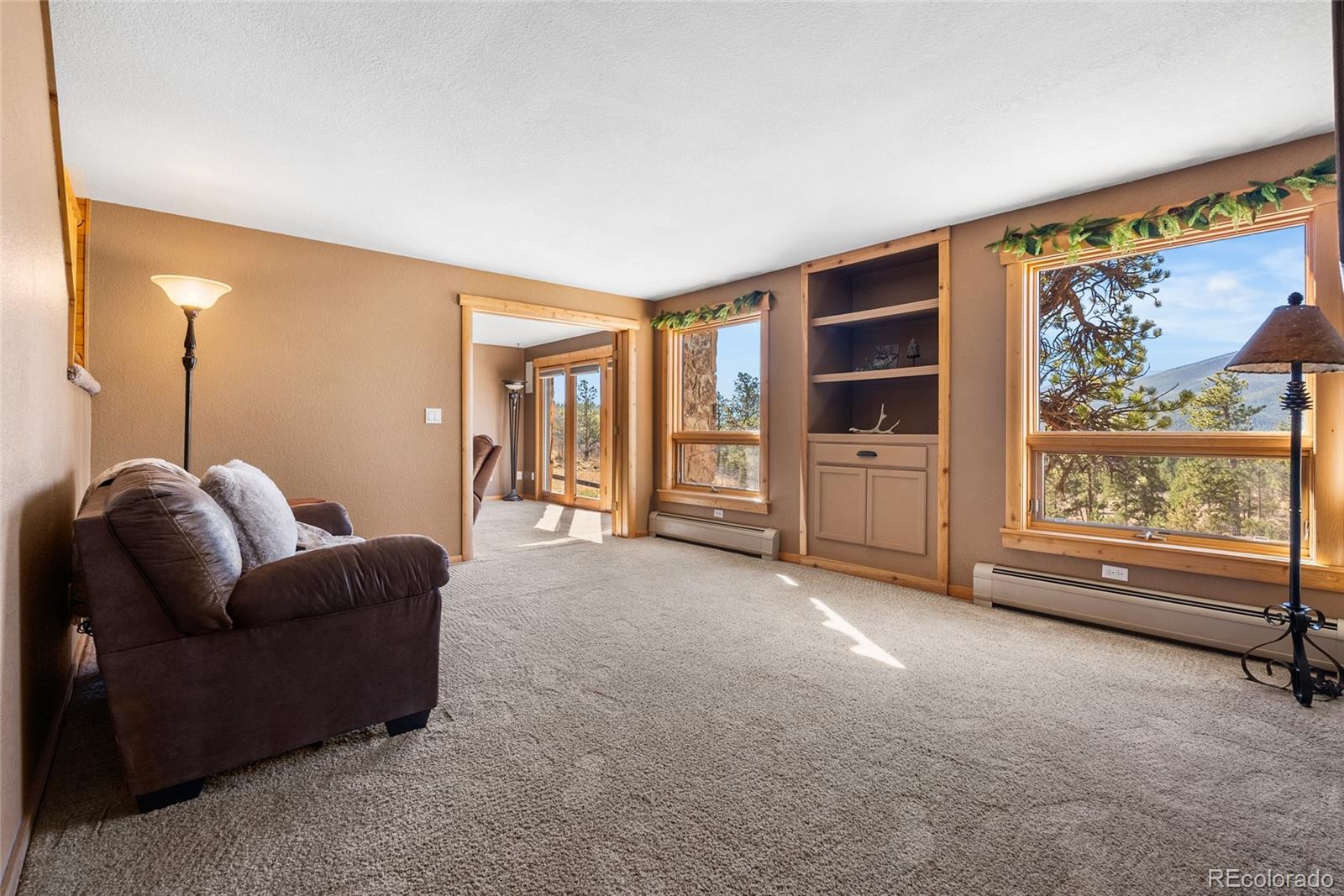 685 Jesse Lane Bailey, CO 80421 - Photo 37 of 50 a living room with furniture and a large window