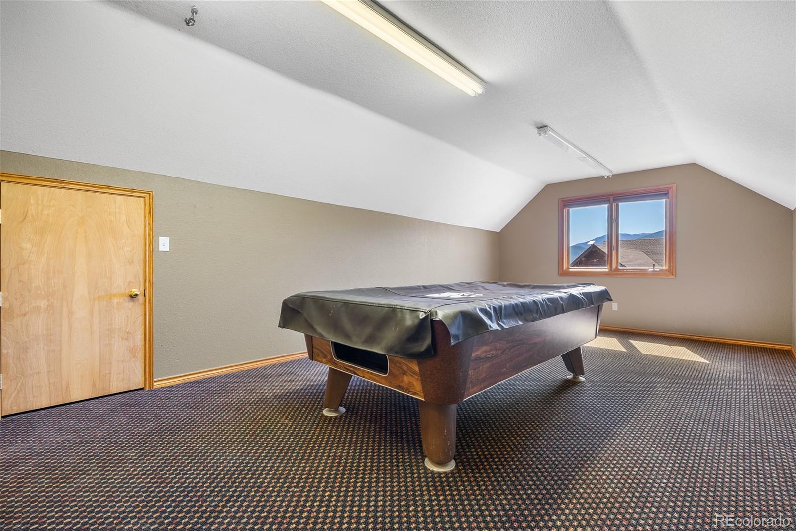 685 Jesse Lane Bailey, CO 80421 - Photo 45 of 50 a living room with a couch and a table