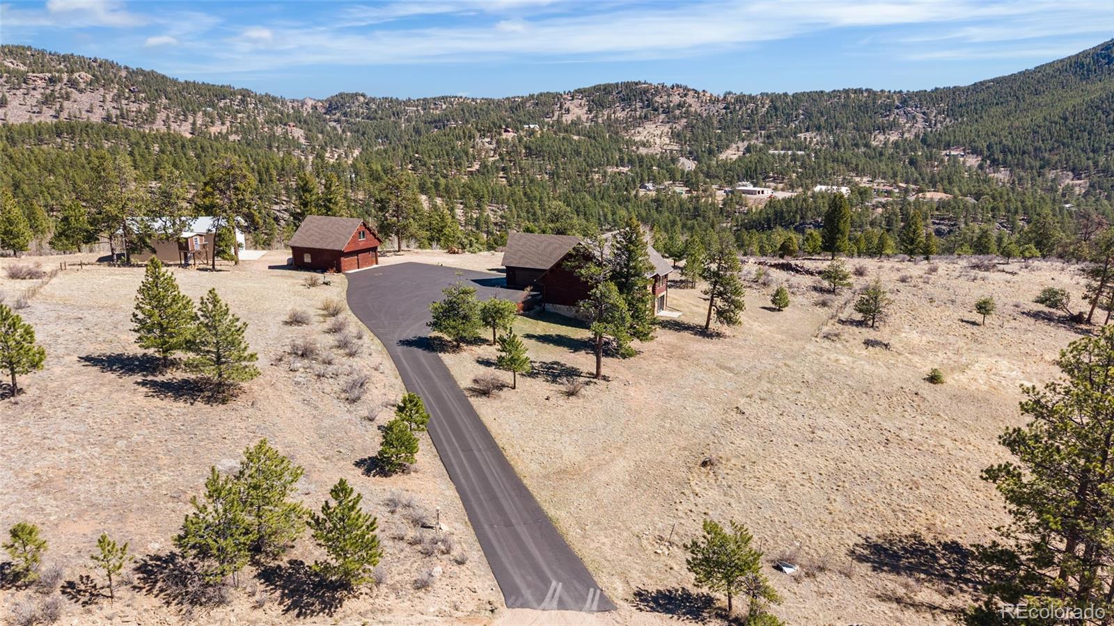 685 Jesse Lane Bailey, CO 80421 - Photo 48 of 50 a view of a lake with a mountain