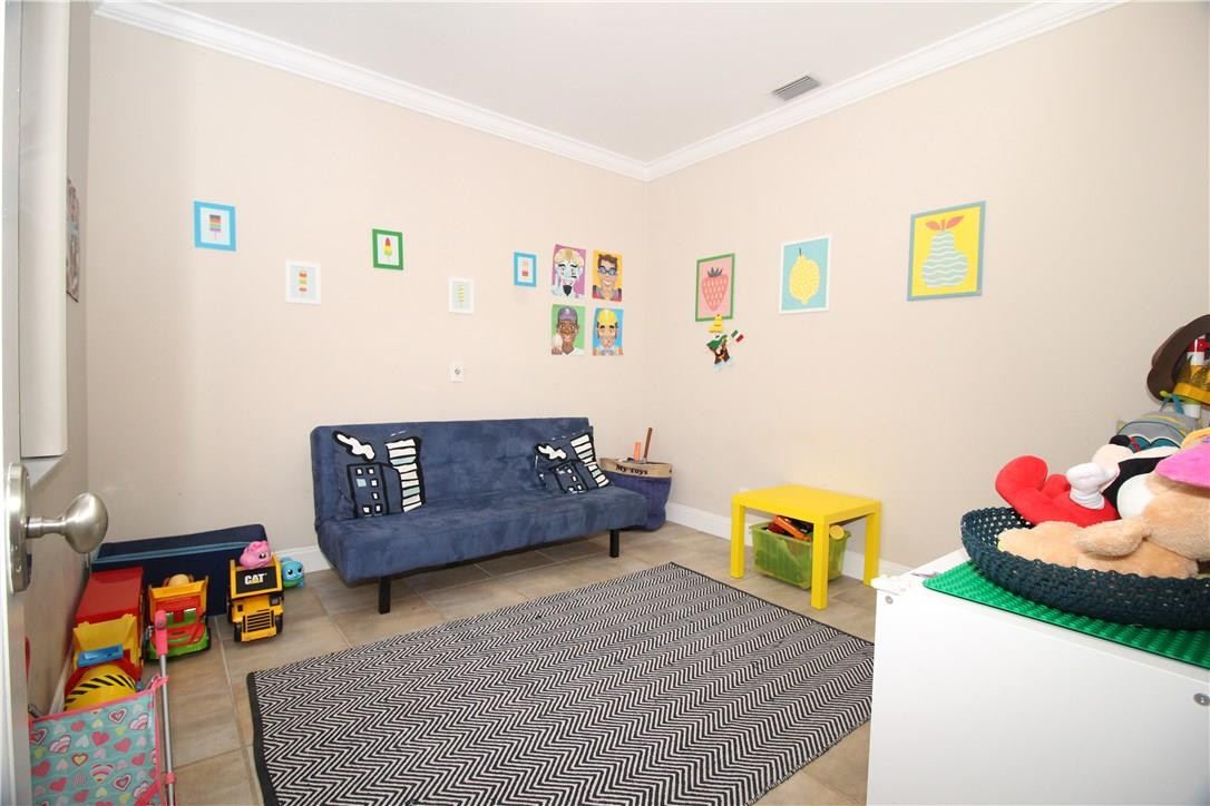 790 Chimney Rock Road Weston, FL 33327 - Photo 5 of 18 a living room with furniture and a couch