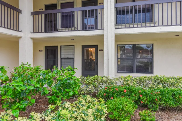 front view of a house with a small yard