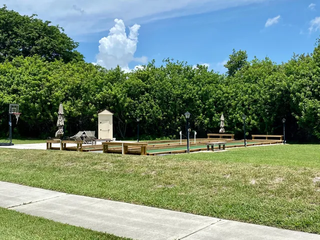 a backyard of a house and trees