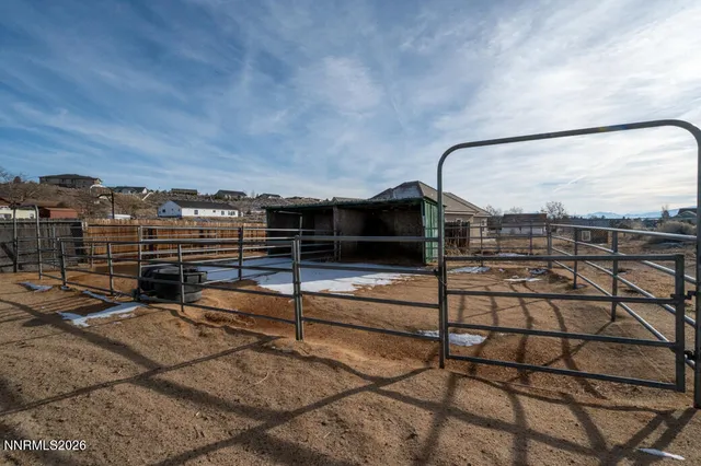 a view of a yard with patio
