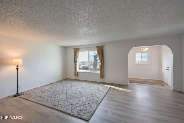 a living room with a fireplace