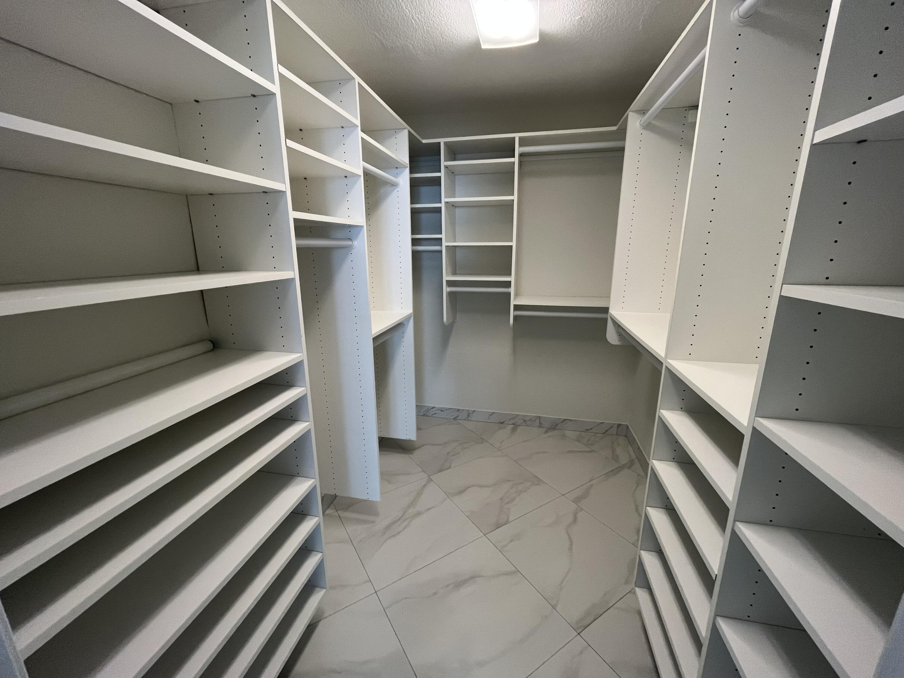 1000 Spanish River Road, Unit 1F Boca Raton, FL 33432 - Photo 21 of 29 Primary Bedroom Large Walk-in