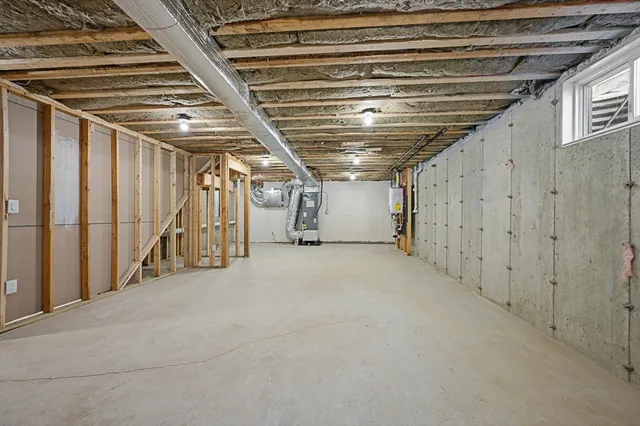 a view of an empty room with wooden walls