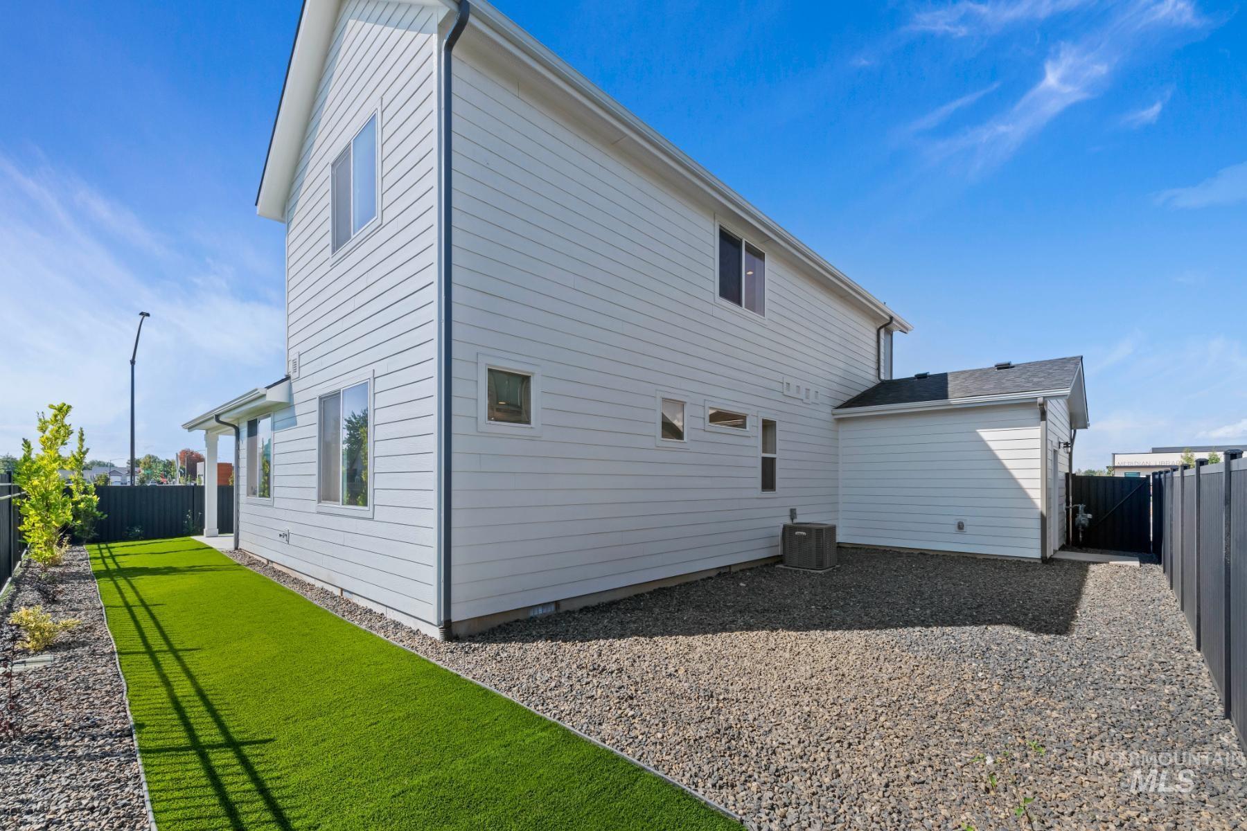 945 West Malbar Street Meridian, ID 83646 - Photo 39 of 42 Rear view of property with a fenced backyard