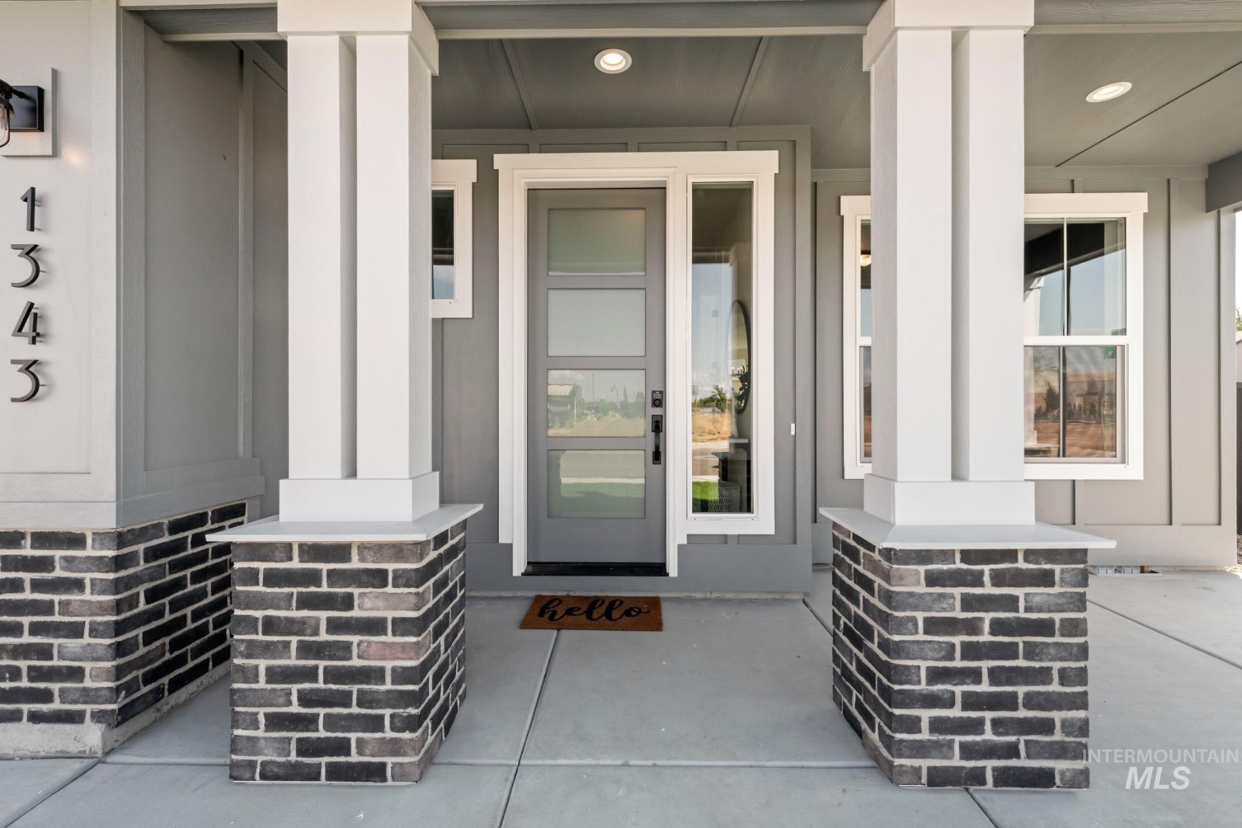 945 West Malbar Street Meridian, ID 83646 - Photo 6 of 42 View of exterior entry with covered porch