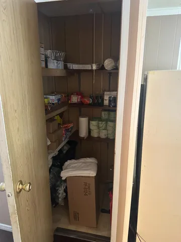 a room with storage and utility