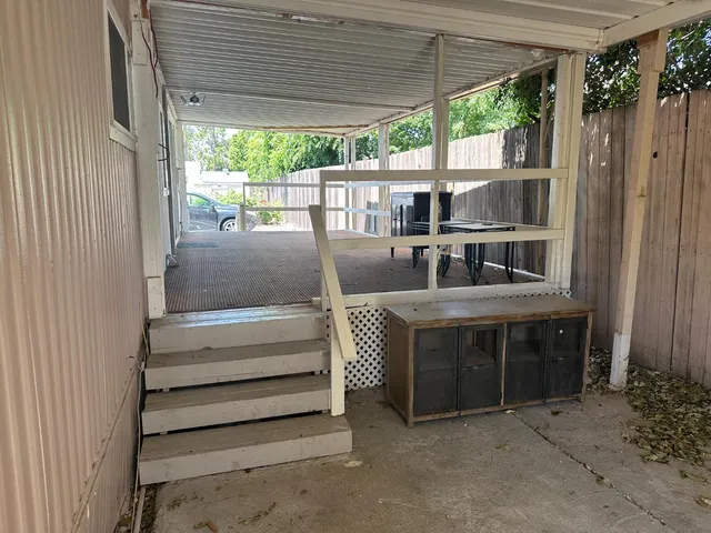 a view of a house with a wooden door