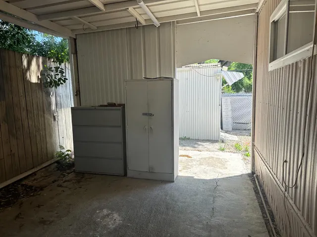 a view of a porch with furniture