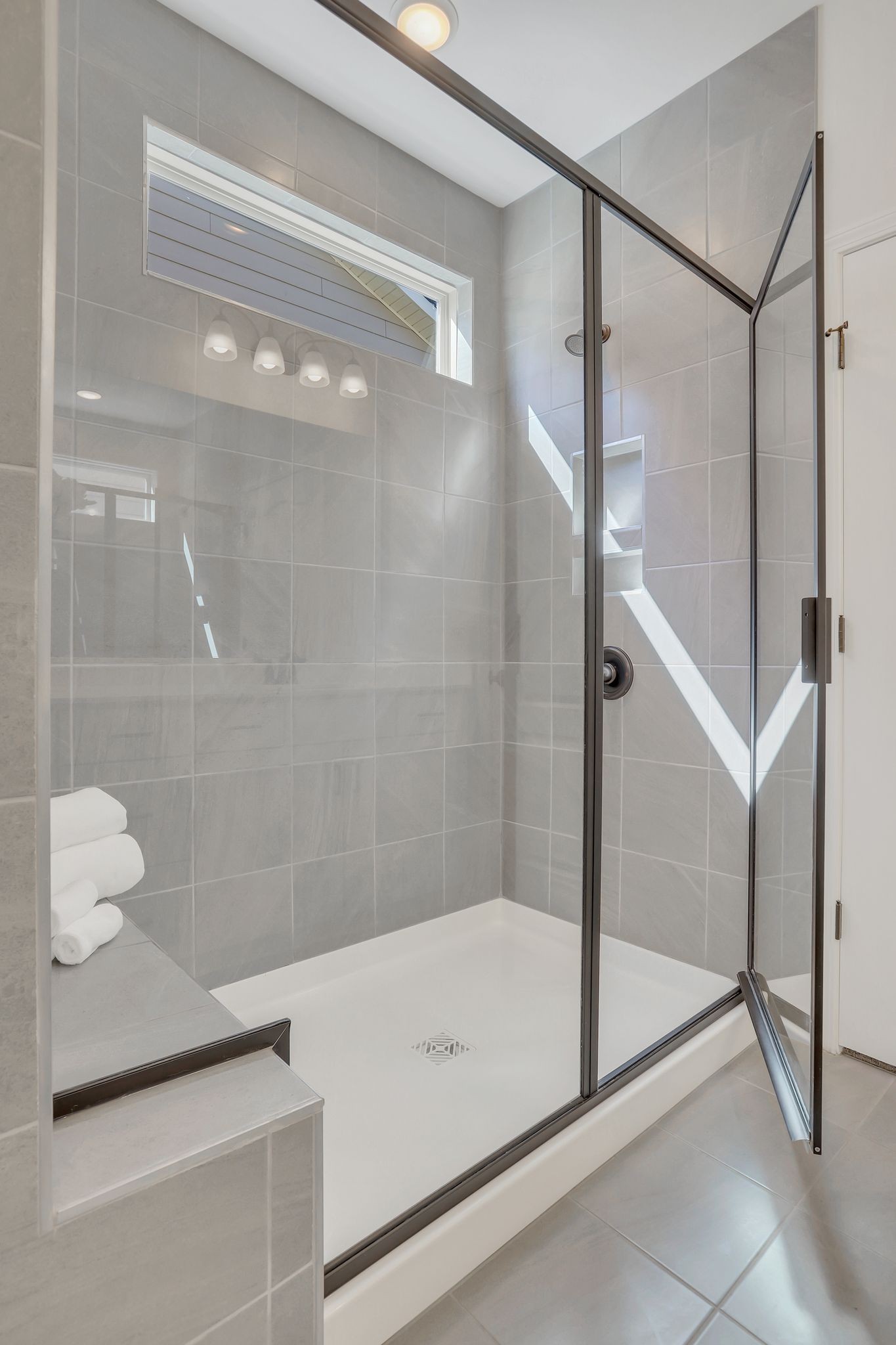 1084 Sumner Grove Spring Hill, TN 37174 - Photo 21 of 40 a bathroom with a bathtub and a shower