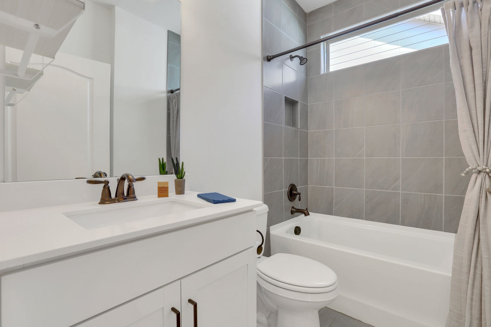 1084 Sumner Grove Spring Hill, TN 37174 - Photo 24 of 40 a bathroom with a sink a toilet and a bathtub