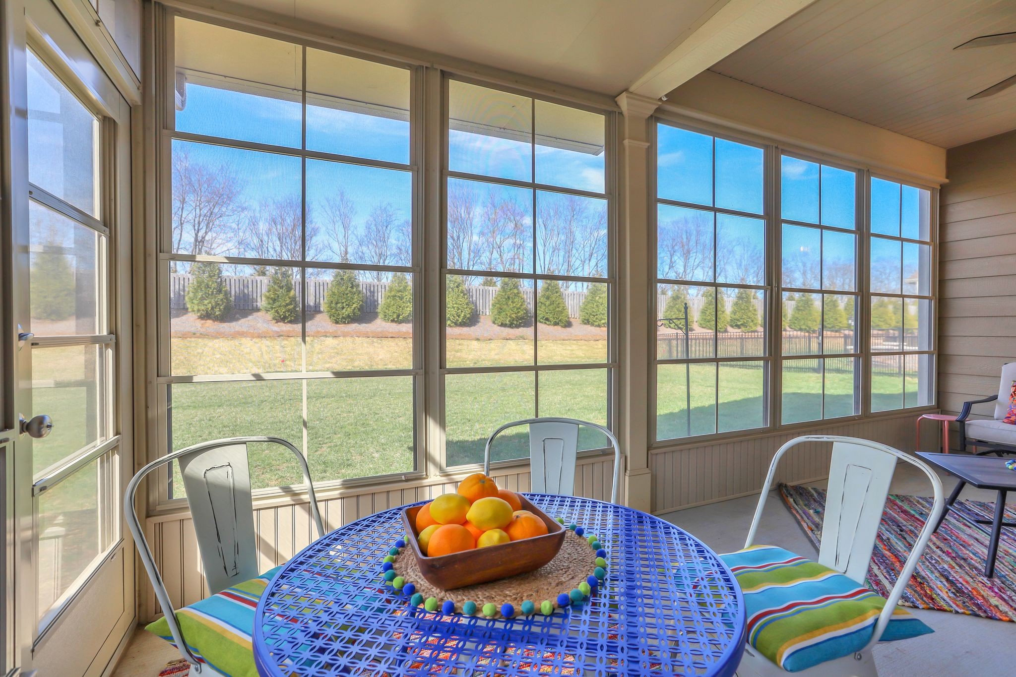 1084 Sumner Grove Spring Hill, TN 37174 - Photo 31 of 40 a living room with furniture and a floor to ceiling window